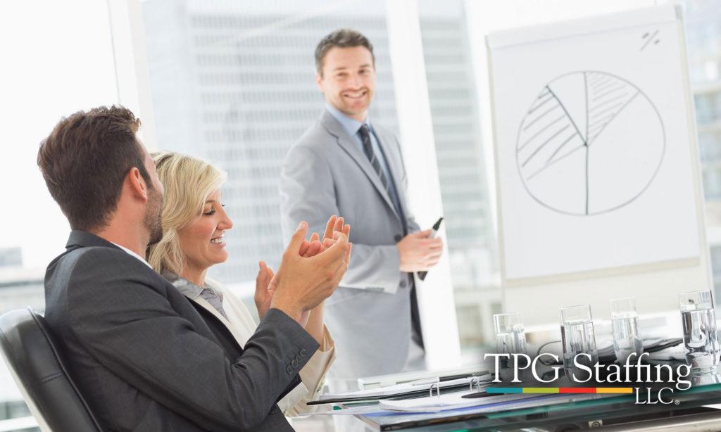 Picture of an employee giving a presentation.